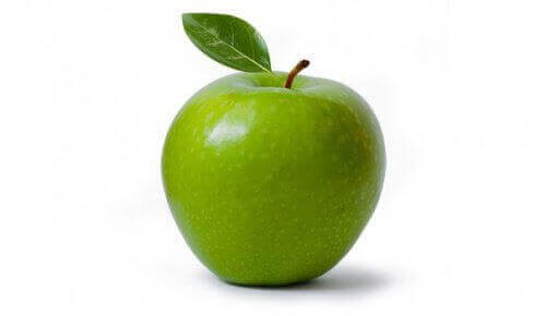 зелене яблуко з листочком