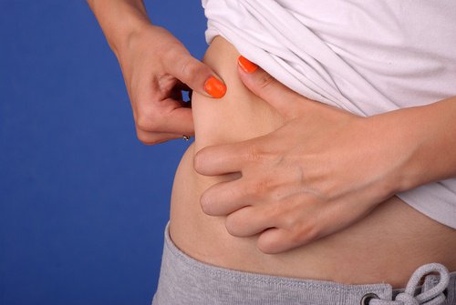 Що призводить до появи жиру на животі та як із ним боротись?