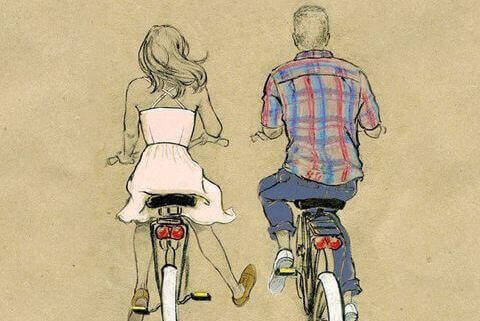хлопець і дівчина на велосипеді