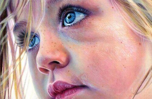 портрет дівчинки з блакитними очима
