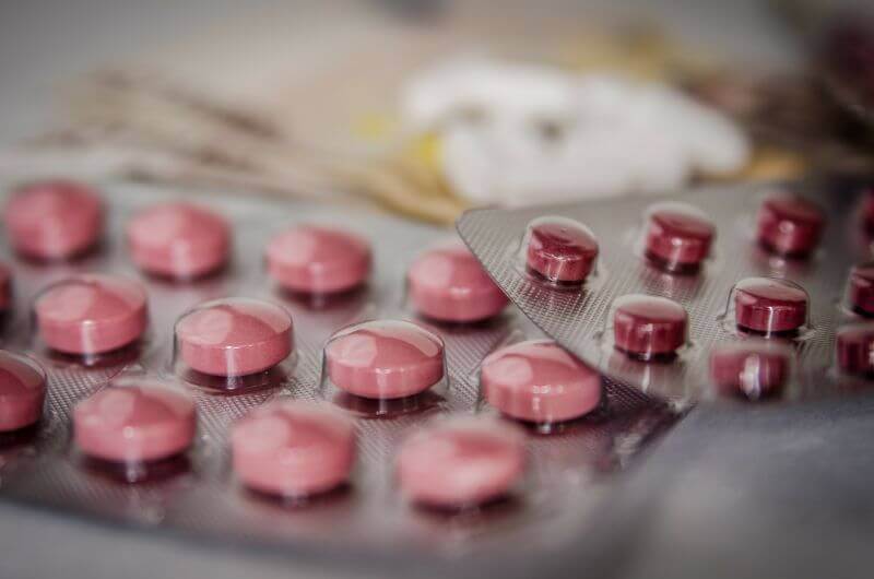 рожеві таблетки у пастилках